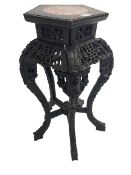 Late 19th to early 20th century Chinese carved hardwood jardiniere or urn stand