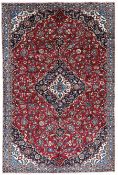 Central Persian Kashan crimson ground rug