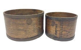 Two 19th century wood and metal bound grain measures