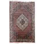 Persian Bidjar pale red ground rug