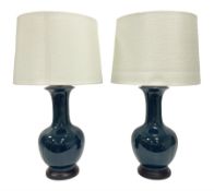 Pair of Chinese teal glazed table lamps