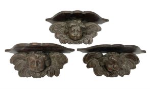 Set of three 18th century oak ecclesiastical wall shelves