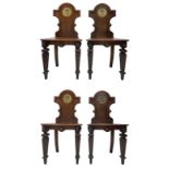 Set of four 19th century mahogany hall chairs
