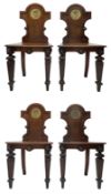 Set of four 19th century mahogany hall chairs