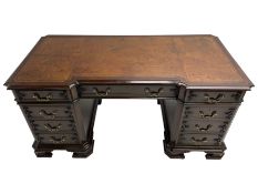 Chippendale design mahogany reverse break-front twin pedestal desk