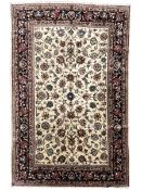 Persian ivory ground rug