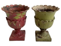 Pair of Victorian cast iron lotus garden urns