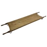 WW1 British casualty stretcher with iron mounted pitch pine sides and canvas base; stamped 'HL1917'