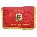 1960s North Vietnam banner embroidered in yellow thread on a red ground