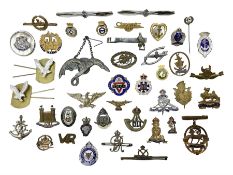 Over thirty military and sweetheart brooches/badges