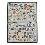 Over one hundred Soviet space programme badges; in two glass topped display boxes (2)