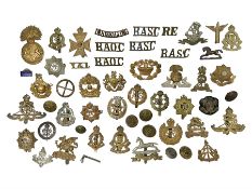 Over thirty WW1 and WW2 cap badges including Royal Marines