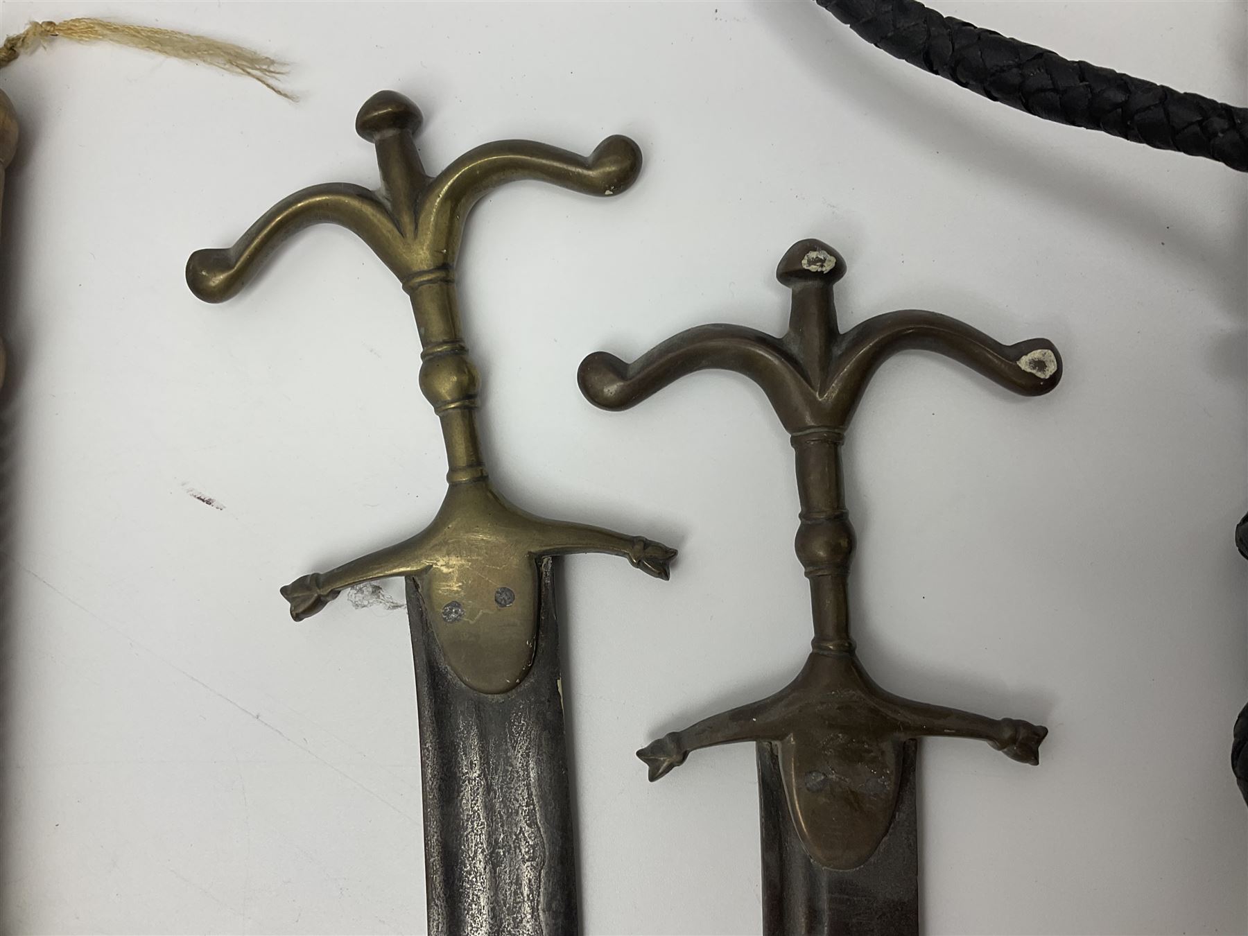Near pair of short swords each with slightly curving 41cm fullered steel blade and all brass H-shape - Image 12 of 19