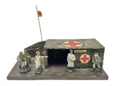 German Lineol playset of a camouflaged Field Hospital with flag and four figures of staff and casual
