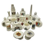 Eighteen WW1 crested china military models including artillery shells