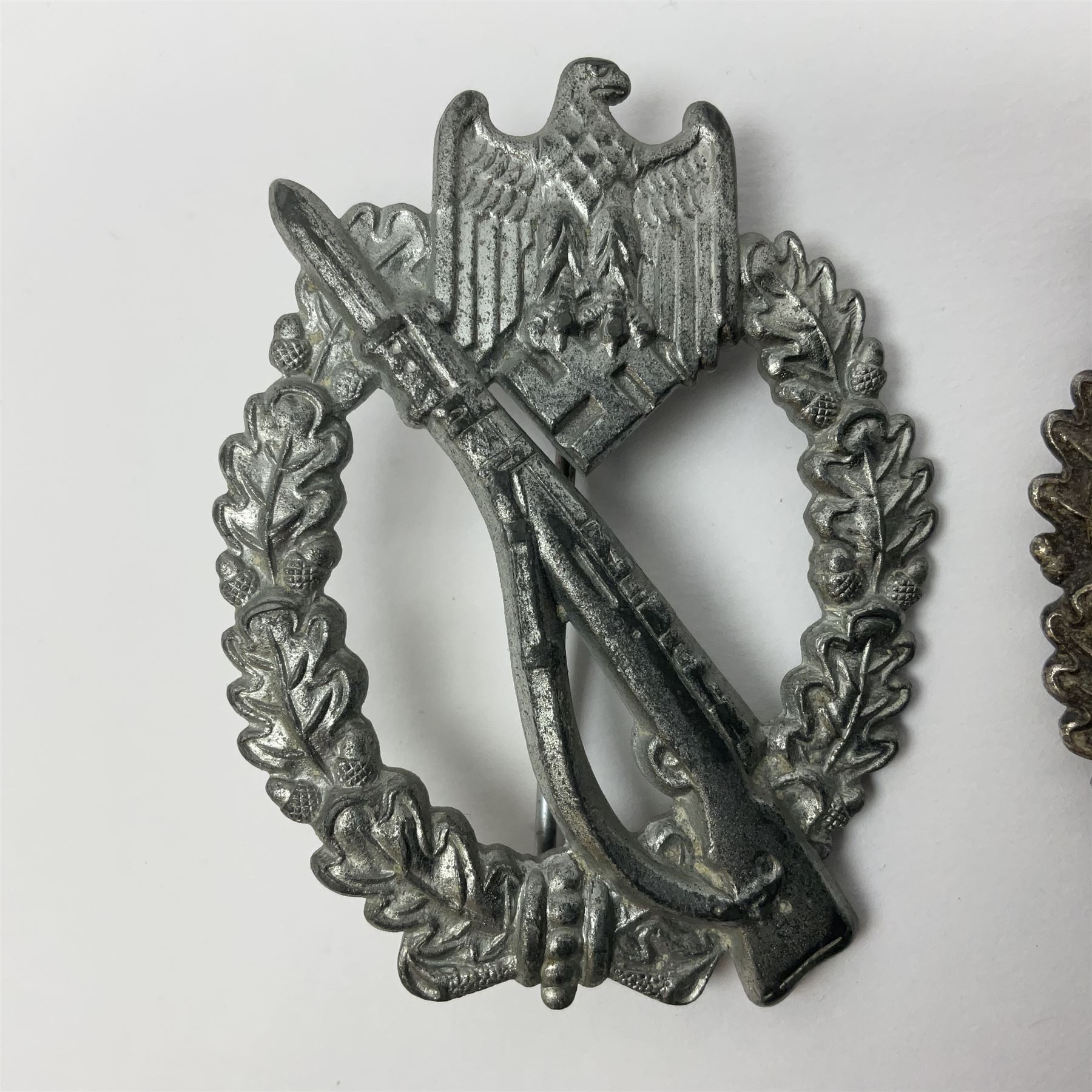 WW2 German 'silver' Infantry Assault badge marked BSW verso; another Infantry Assault badge; and a s - Image 2 of 11