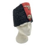 WW2 German small size Balkan style hat with 'SS' metal badges; red cloth top and flash to front with