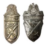 Two German Arm-Shield badges - one Russian Front marked Demjansk 1942; the other marked Narvik 1940