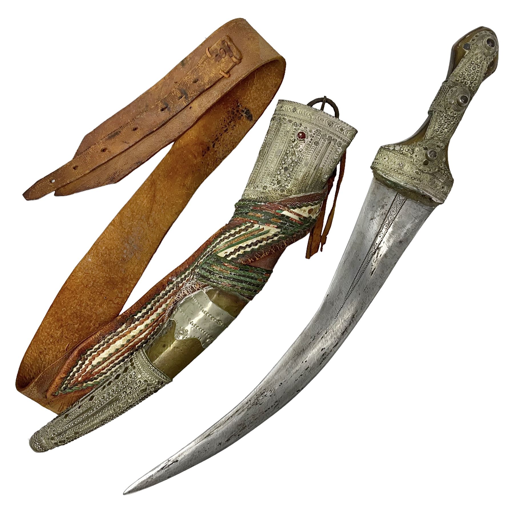 Saudi Arabian khanjar dagger with 29.5cm curving double edged steel blade; white metal and copper m