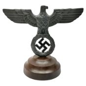 WW2 German cast white metal desk ornament/paperweight as the eagle insignia on later turned mahogany