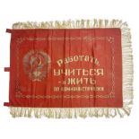 1970s Soviet banner printed in gold on a red ground
