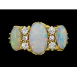 Early 20th century gold three stone opal and six stone old cut diamond ring