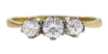 Mid 20th century 18ct gold three stone round brilliant cut diamond ring