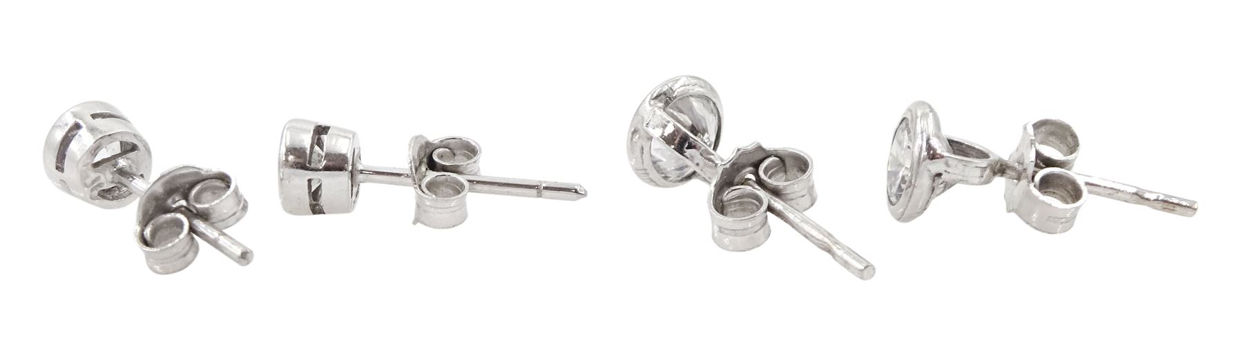 Pair of 9ct white gold white sapphire stud earrings and a similar pair of 9ct white gold cubic zirco - Image 2 of 2