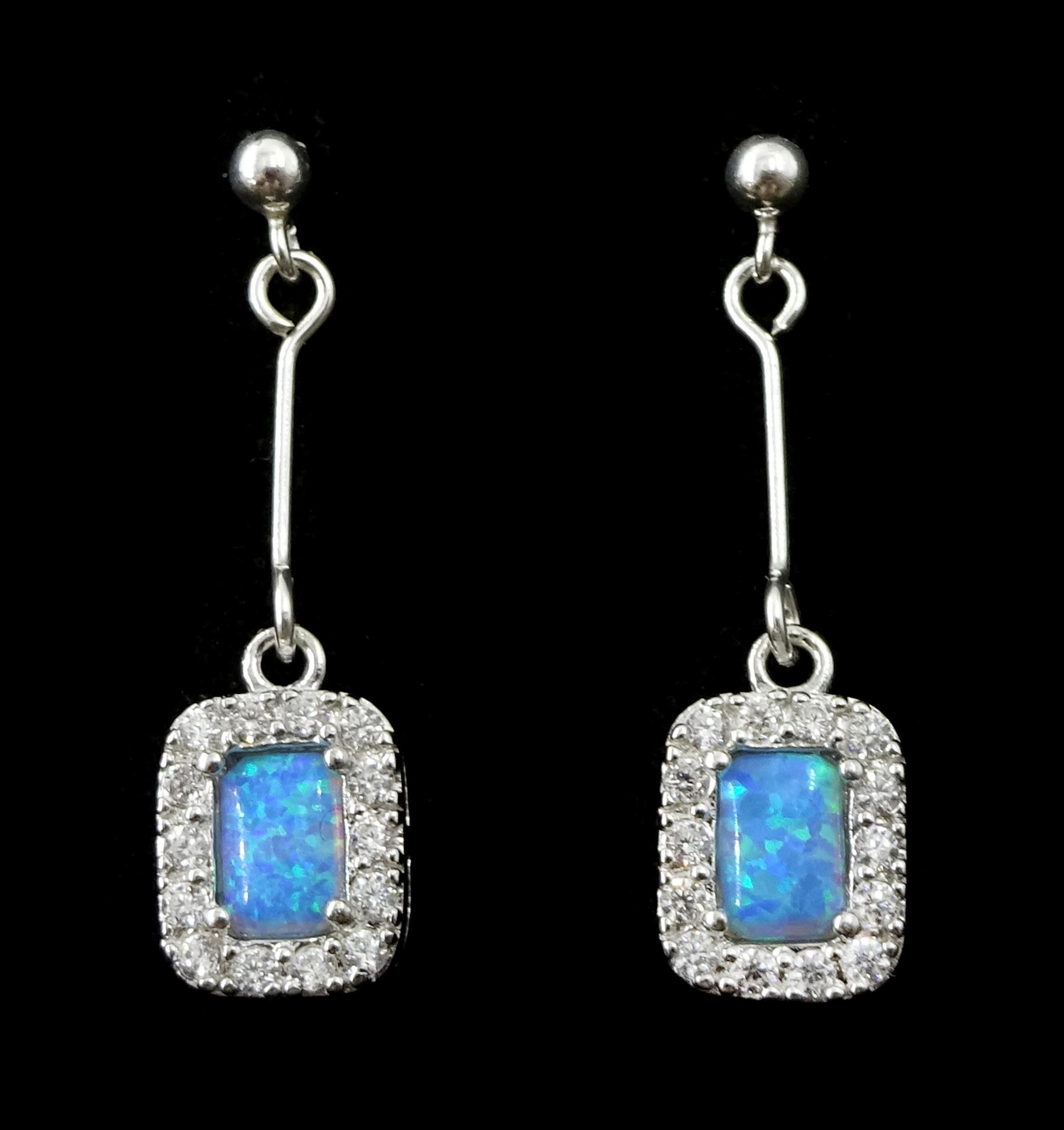 Pair of silver opal and cubic zirconia cluster pendant stud earrings