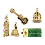 Five 9ct gold pendant/charms including Soda Syphon