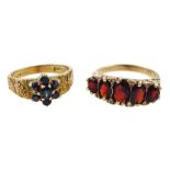 Gold garnet and diamond chip ring and a gold sapphire cluster ring