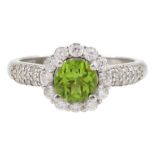 Silver peridot and cubic zirconia flower cluster ring