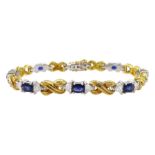 18ct gold eight oval cut sapphire and sixteen trillion cut diamond bracelet