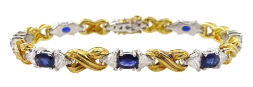 18ct gold eight oval cut sapphire and sixteen trillion cut diamond bracelet