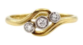 Early 20th century gold milgrain set three stone old cut diamond crossover ring