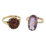 Early 20th century rose gold single stone amethyst ring and a later garnet cluster ring