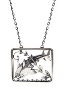 Silver double dolphin pendant necklace designed by Arno Malinowski for Georg Jensen