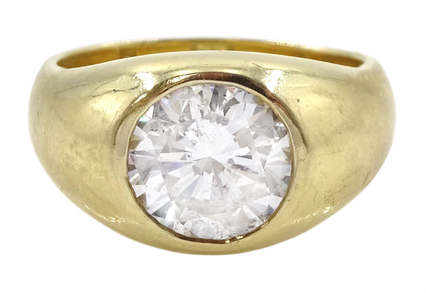 Gold single stone bezel set round brilliant cut diamond ring