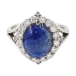 18ct gold cabochon sapphire and round brilliant cut diamond cluster ring