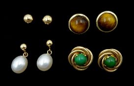 Four pairs of 9ct gold stud earrings