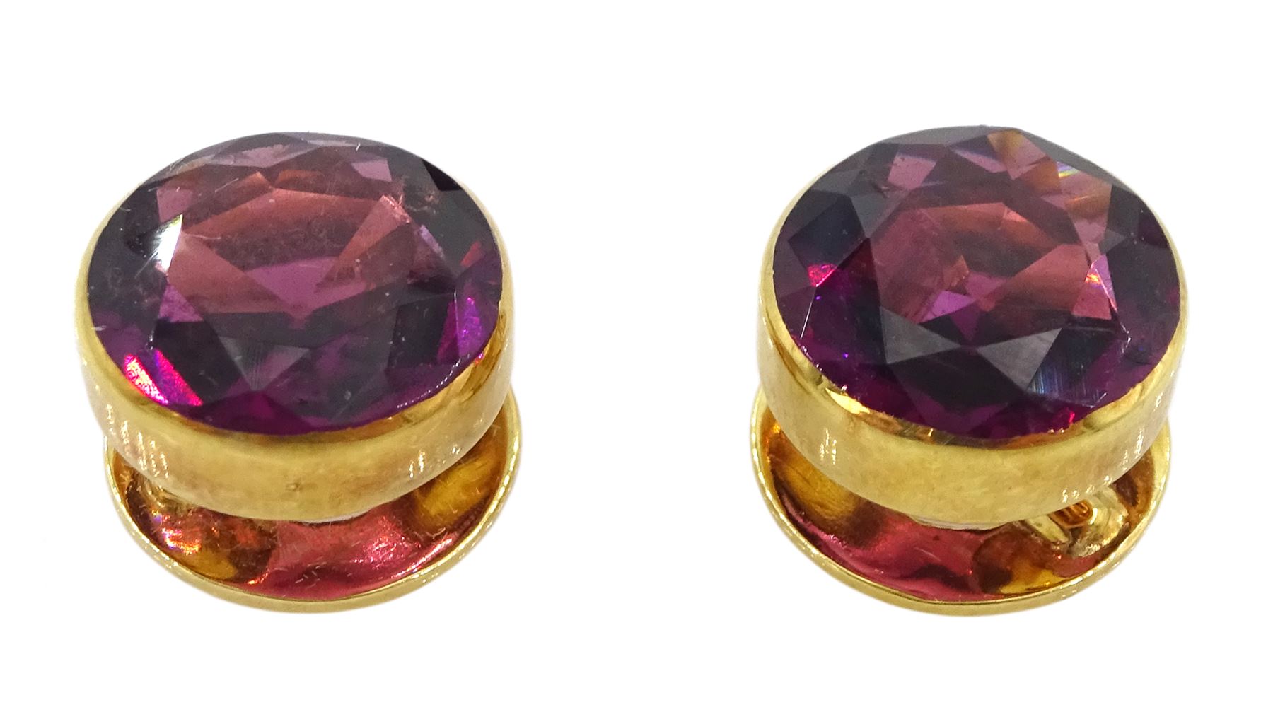 Pair of early 20th century 18ct gold round cut garnet shirt studs