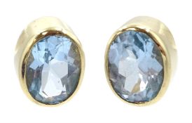 Pair of 9ct gold oval blue topaz stud earrings