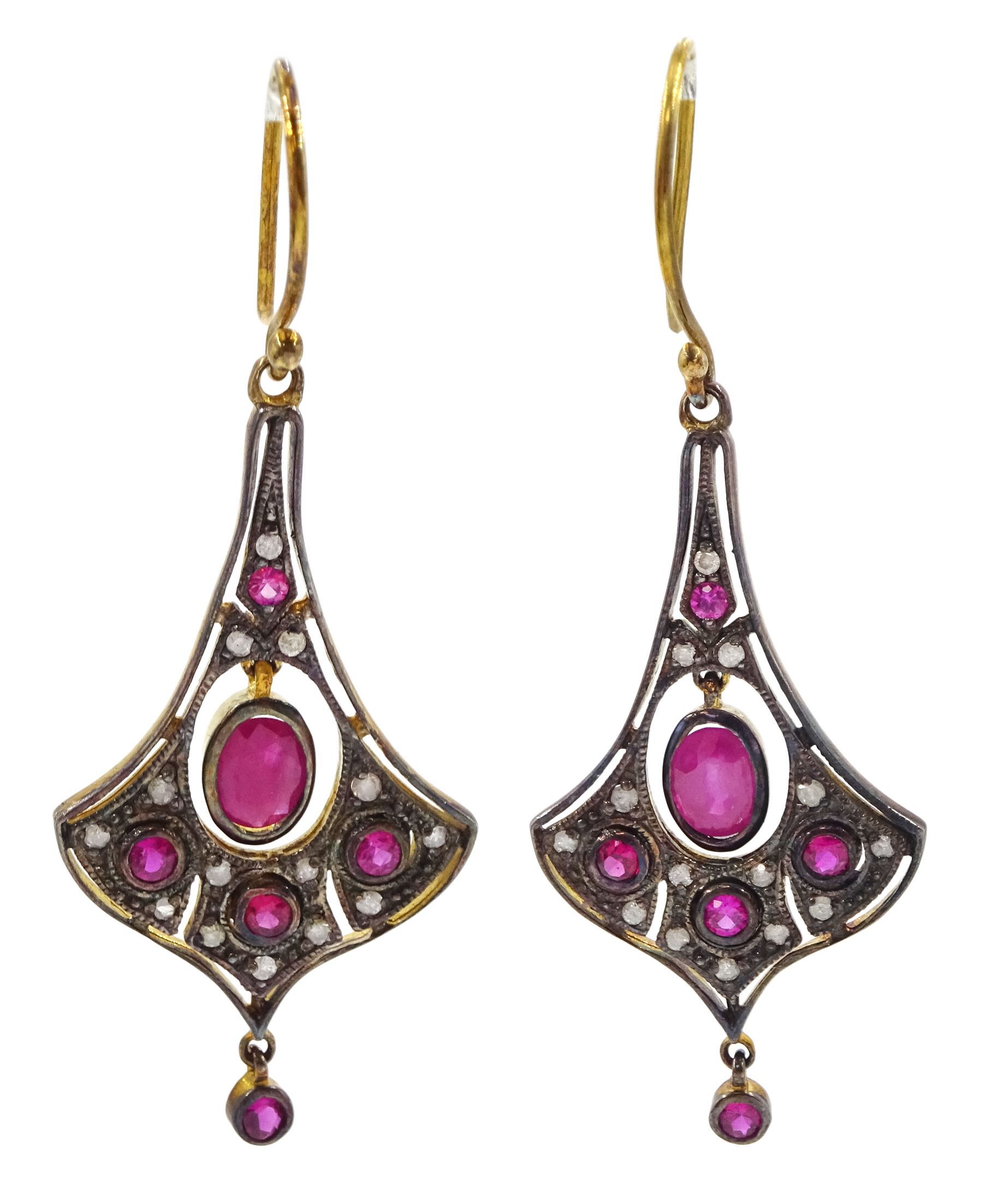 Pair of gold and silver milgrain set ruby and diamond pendant earrings