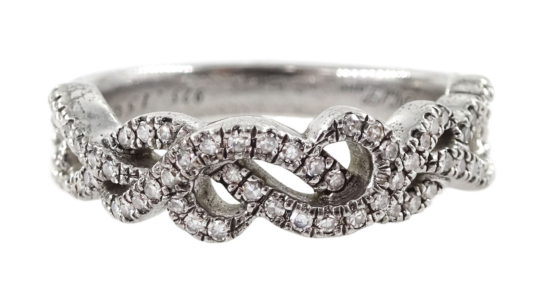 Silver round brilliant cut diamond twist ring by Neil Lane