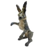 Studio pottery novelty jar and cover modelled as a hare raised upon its back legs