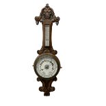 English - Edwardian aneroid barometer in a carved scroll work oak case