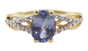 9ct gold oval tanzanite and diamond openwork ring