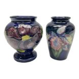 Moorcroft Clematis pattern upon cobalt blue ground miniature globular vase