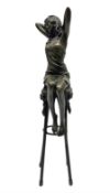 Art Deco style bronze modelled as a female figure seated upon a chair