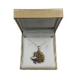 Silver Baltic amber hedgehog pendant necklace